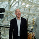 Jeff Bezos, center, the CEO and founder of Amazon.com, laughs as he talks with Ron Gagliardo, right, the lead horticulturist of the Amazon Spheres, following the grand opening ceremony for the plant-filled geodesic domes built for Amazon.com employees.